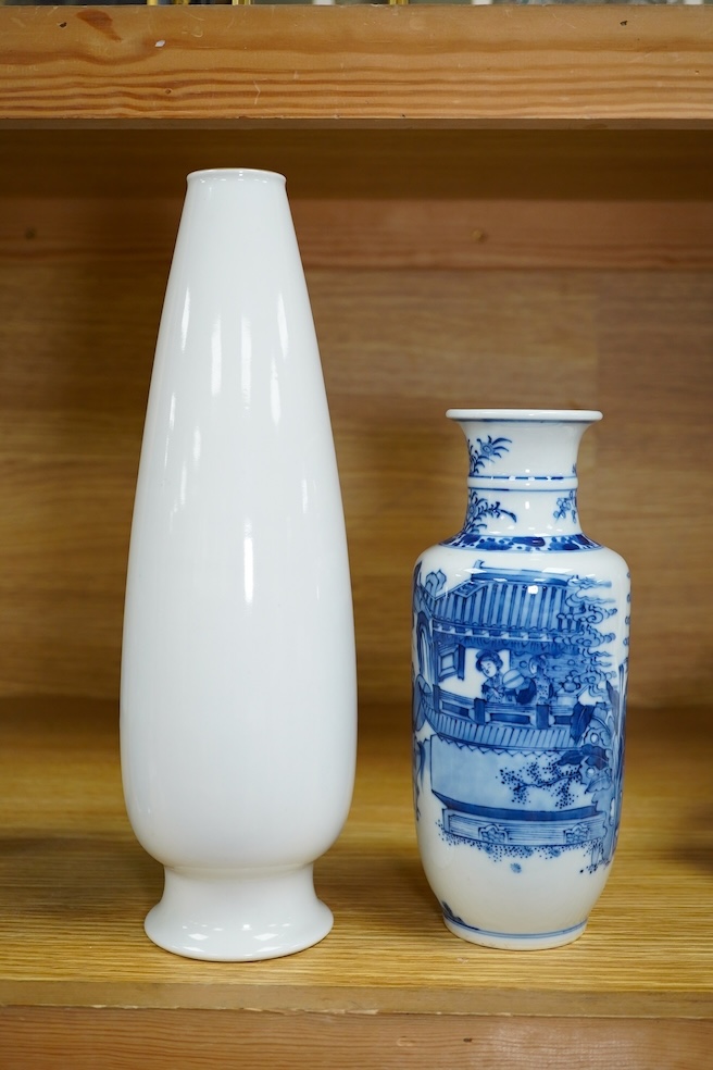 A Chinese blue and white vase and an enamelled figurative porcelain example, tallest enamel vase 29cm high. Condition - good